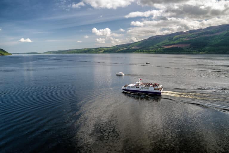 LOCH NESS, SCOTLAND, MAY 23: Cruise ship on lake Loch Ness full of tourists in Loch Ness