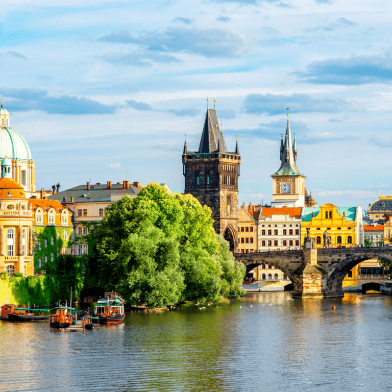 cityscape view on the riverside with the bridge and old town, prague